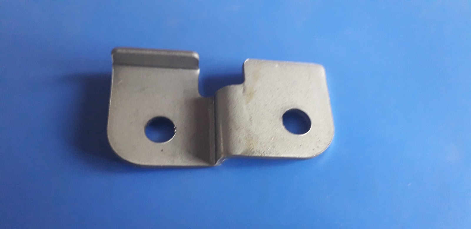 Deep drawn automotive transmission housing component with precision tolerances